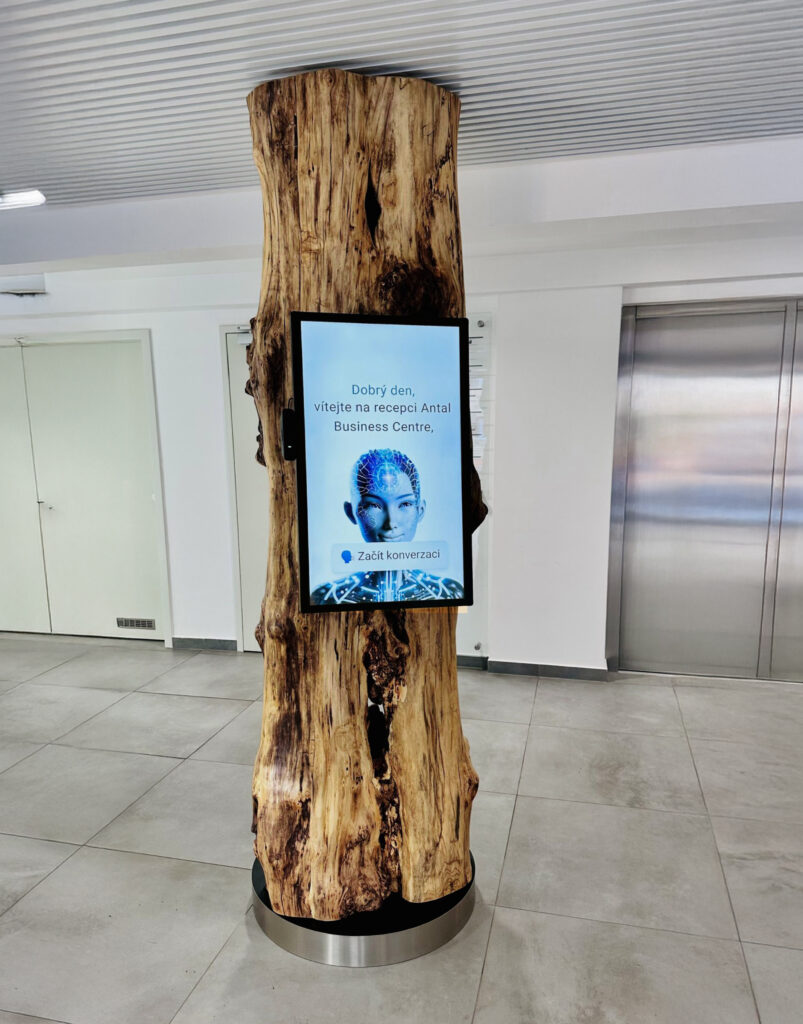 AI receptionist Kamila — smart reception system at Antal Business Centre (custom LCD + external PC).